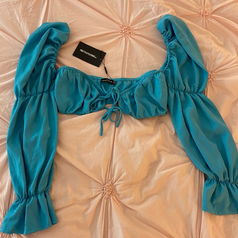Bright blue puff long sleeve tie in front crop top
